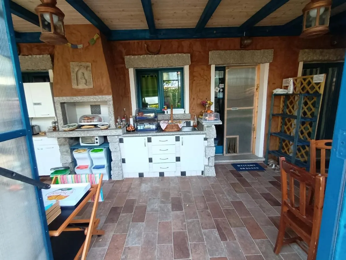 Bed & Breakfast Portopollo Surfhouse Barrabisa